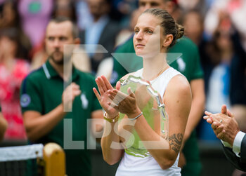 2021-07-10 - Karolina Pliskova of the Czech Republic with the runner-up trophy after losing against Ashleigh Barty of Australia after the final of The Championships Wimbledon 2021, Grand Slam tennis tournament on July 10, 2021 at All England Lawn Tennis and Croquet Club in London, England - Photo Rob Prange / Spain DPPI / DPPI - WIMBLEDON 2021, GRAND SLAM TENNIS TOURNAMENT - INTERNATIONALS - TENNIS